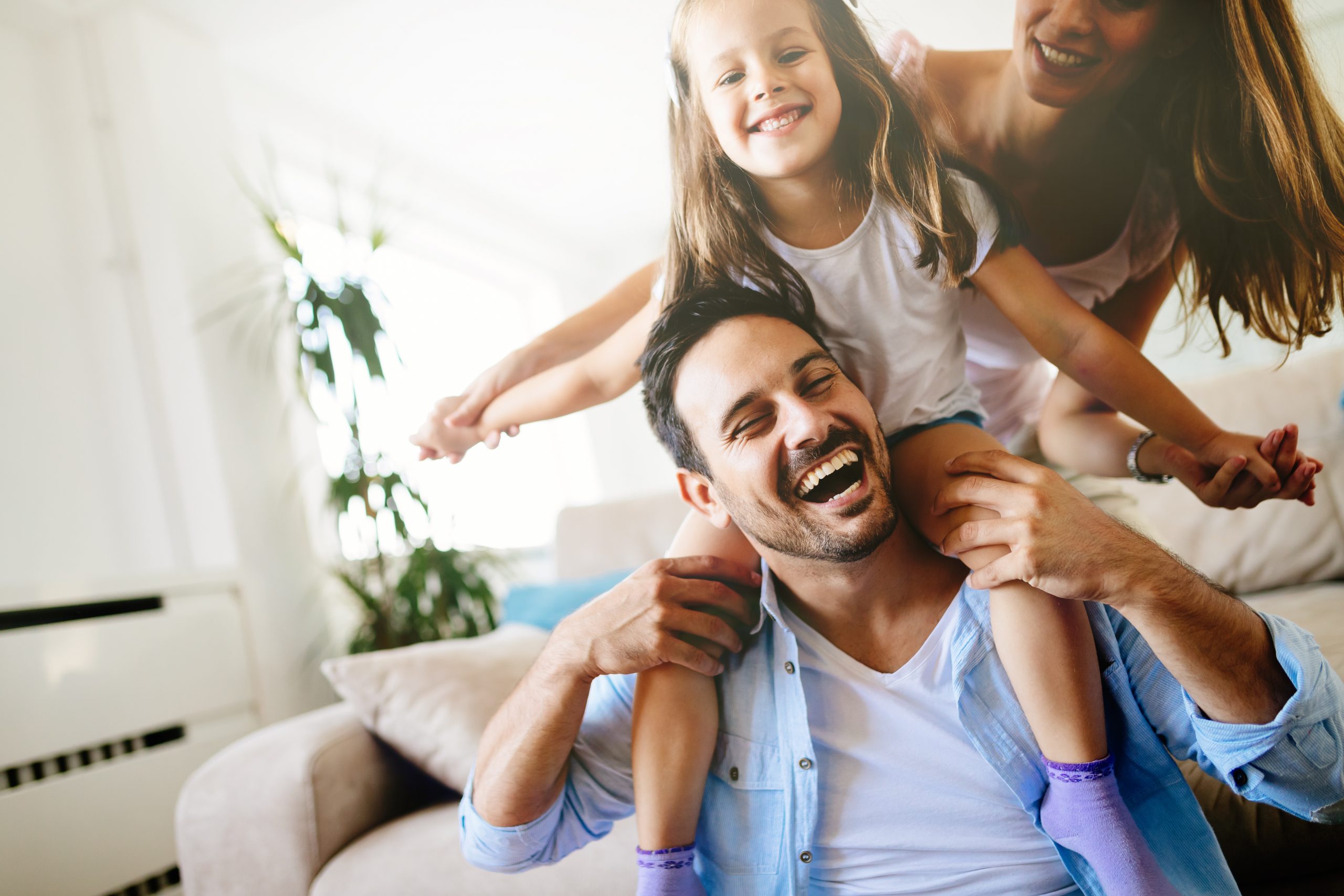 Happy family having fun times at home